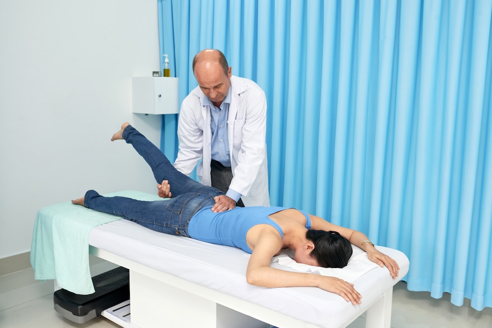 a woman getting help with her spine